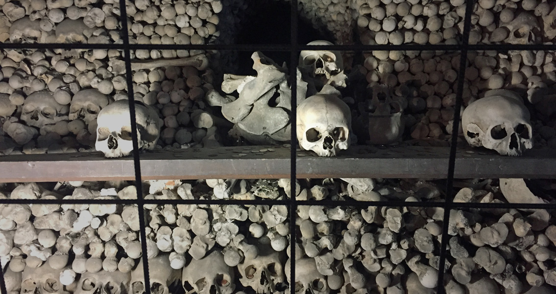Moisture and salts had severely decayed the masonry of the three historic buildings pictured above. View of one of the bone piles in Sedlec ossuary.